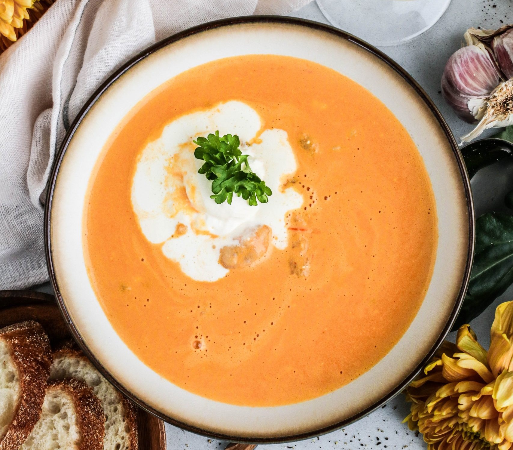 Creamy langoustine soup served in a bowl